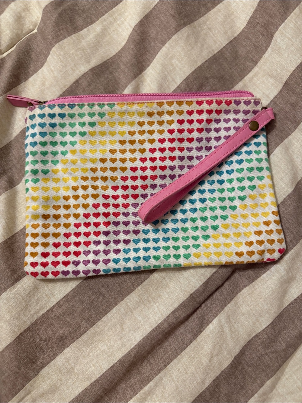 Pink Wristlet Pouch with Rainbow Heart Print and key chain.